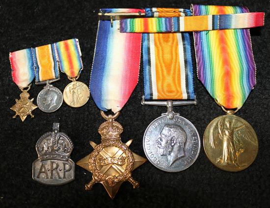 Various war medals and a silver pendant